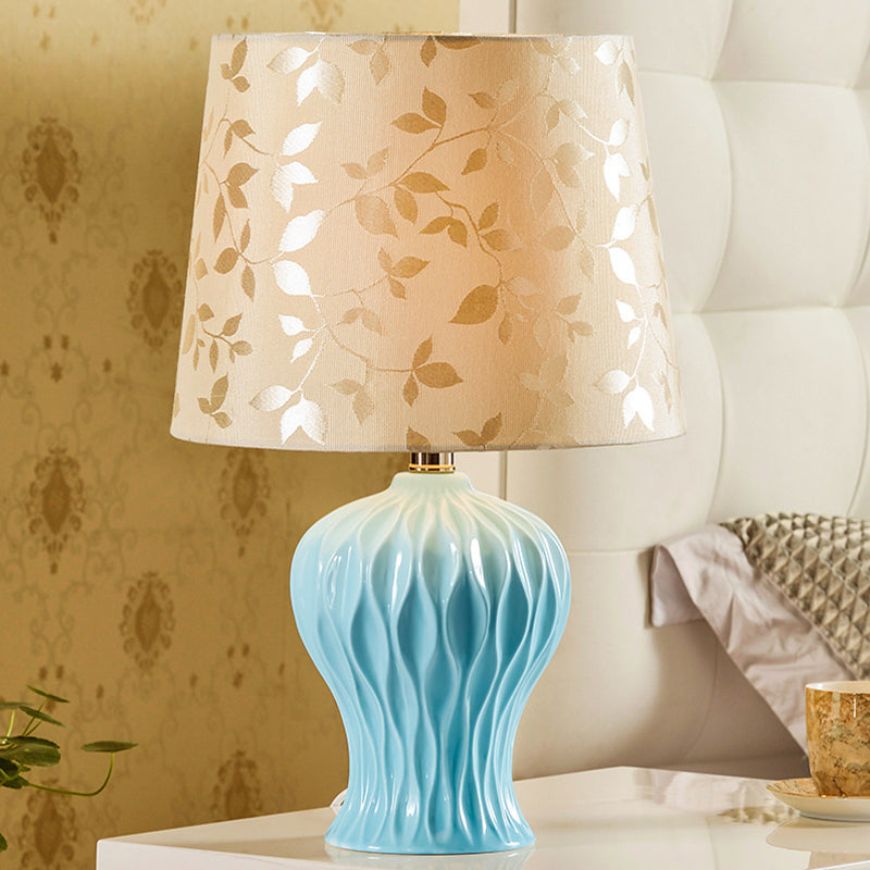 Leaf-Printed Fabric Beige Night Light Barrel Shade 1-Light Traditional Table Lighting with Blue Urn Base