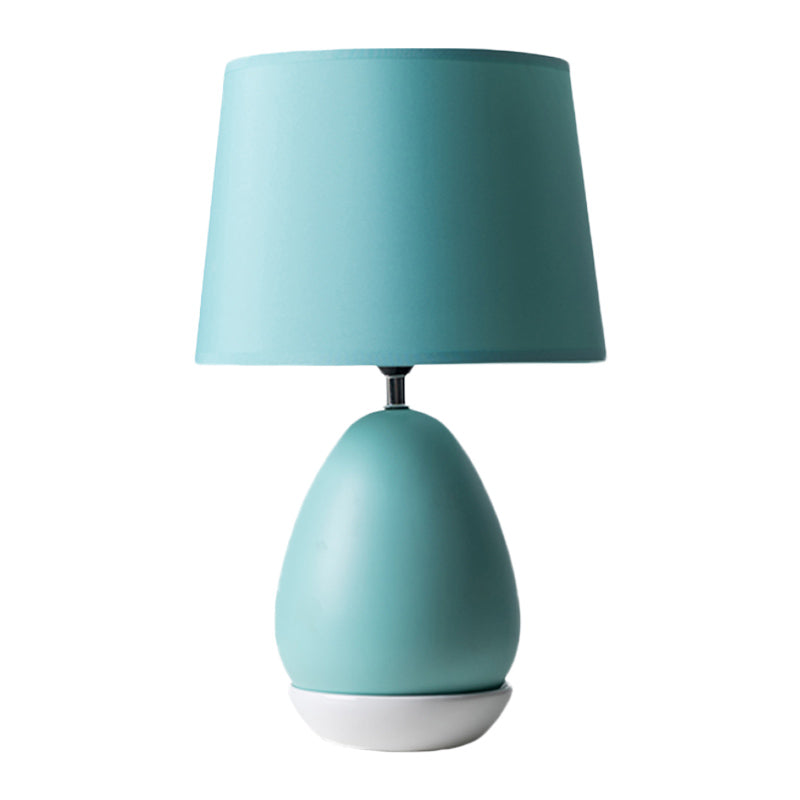 Egg-Shaped Bedside Night Light Modern Ceramic 1 Head Blue Table Stand Lamp with Drum Fabric Shade