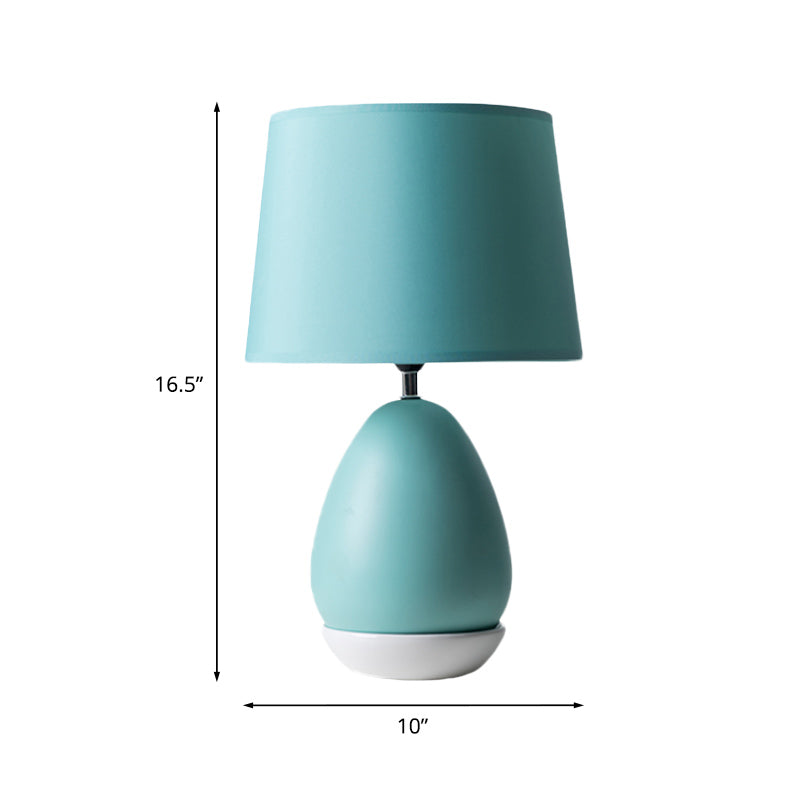 Egg-Shaped Bedside Night Light Modern Ceramic 1 Head Blue Table Stand Lamp with Drum Fabric Shade