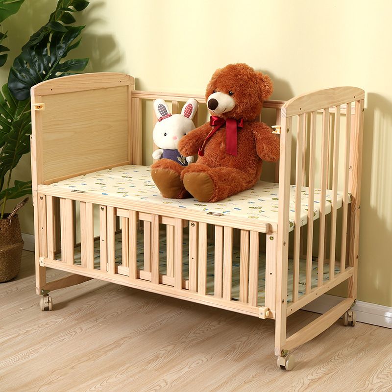 Convertible Nursery Crib with Casters and Changing Table in Light Wood