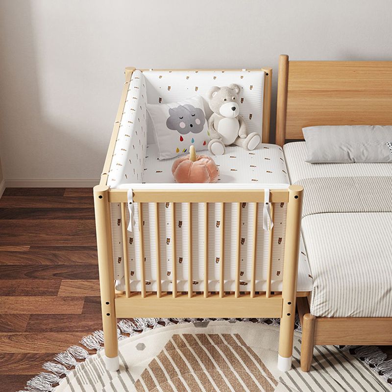 Modern Farmhouse Nursery Crib with Adjustable Height in Natural Wood