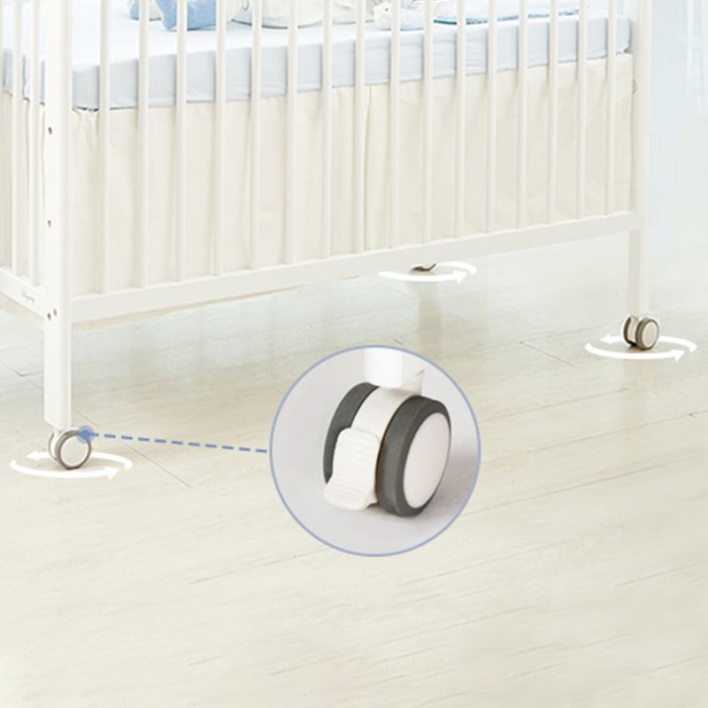 Contemporary Wood Nursery Bed in White with Wheels and Storage