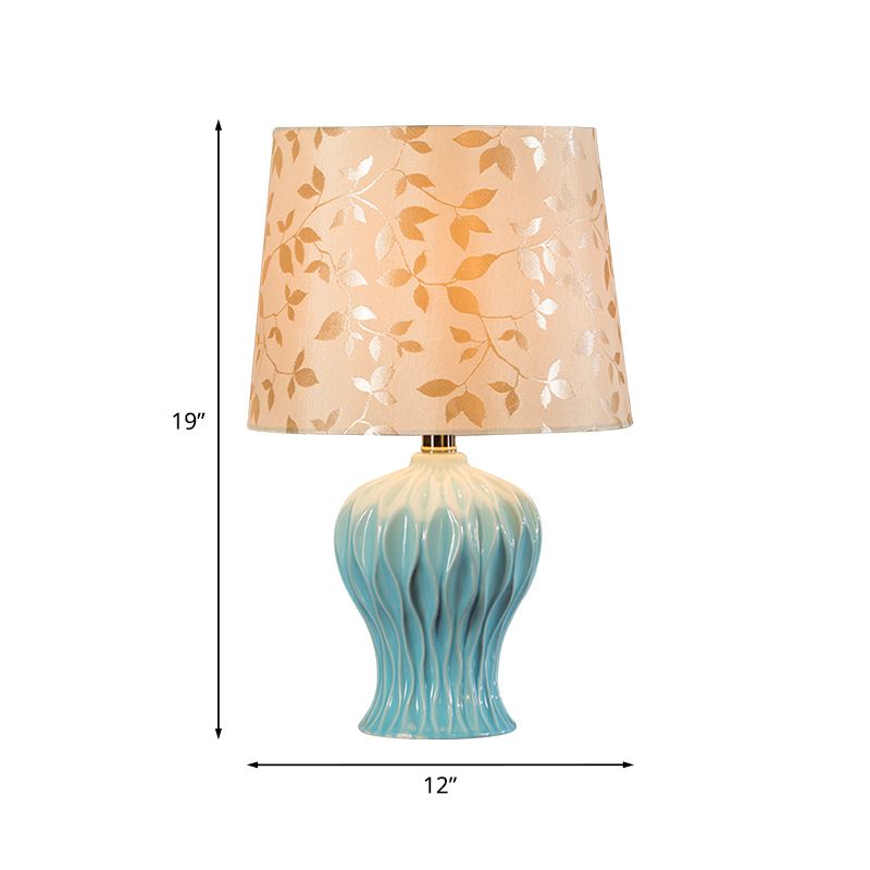 Leaf-Printed Fabric Beige Night Light Barrel Shade 1-Light Traditional Table Lighting with Blue Urn Base