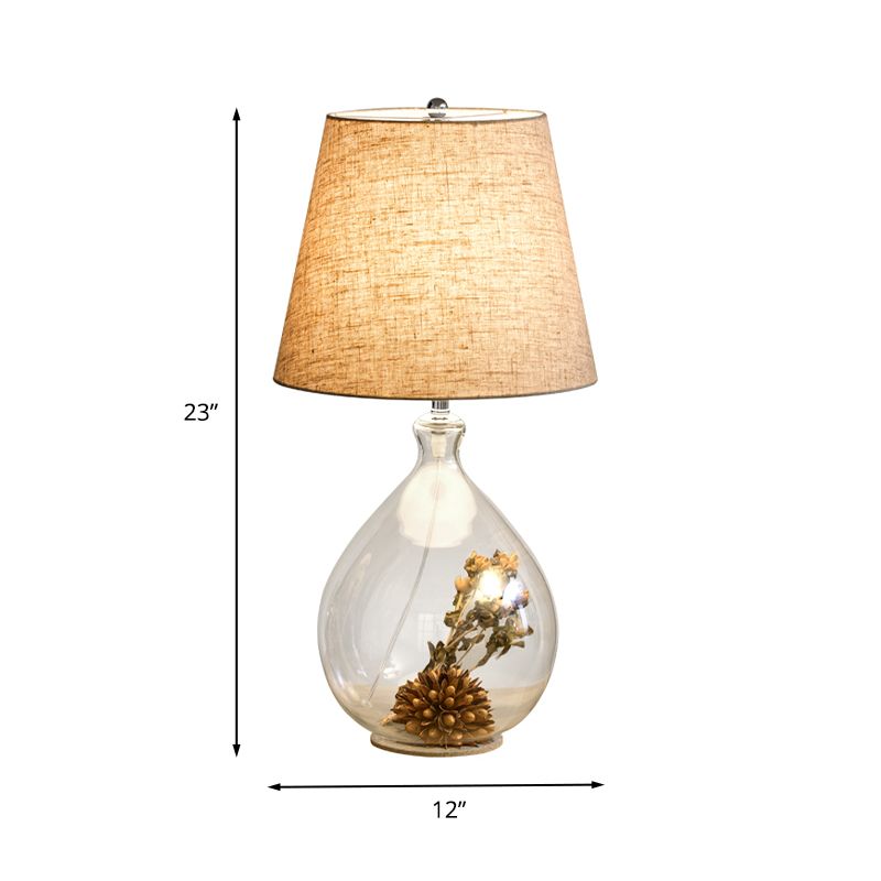 Modern 1 Head Table Light Clear Waterdrop/Bottle Glass Night Lighting with Dried Flower Decor and Flaxen Fabric Shade