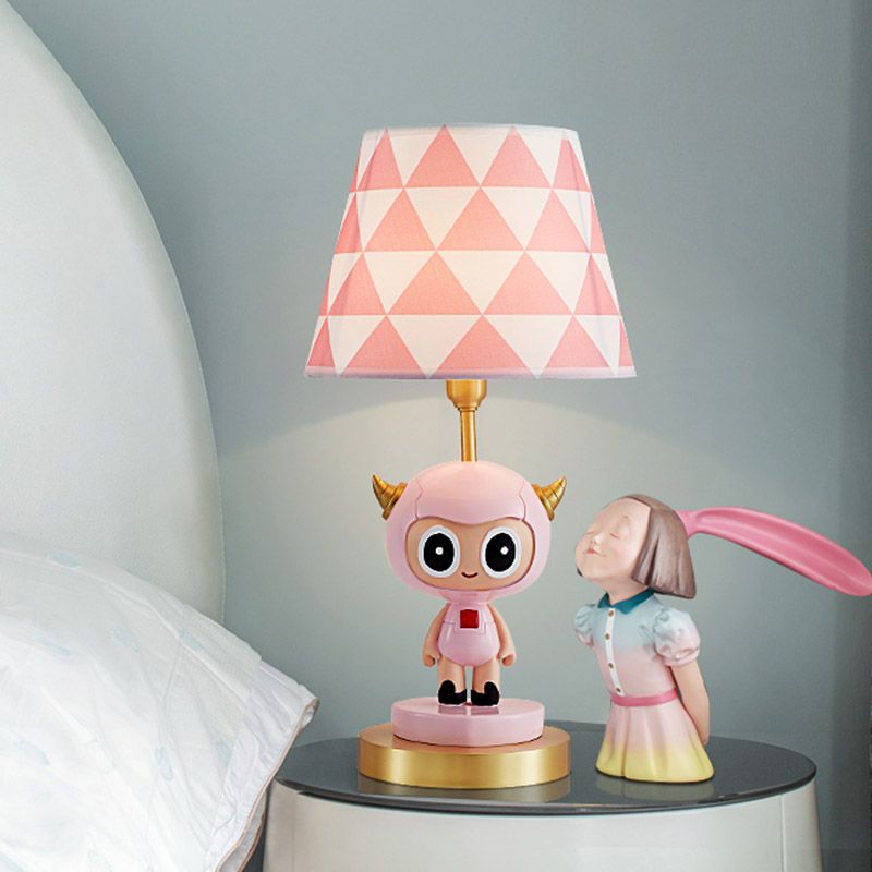 Cartoon Cow Boy Resin Night Lamp 1-Light Table Lighting with Triangle Print Shade in Pink/Blue