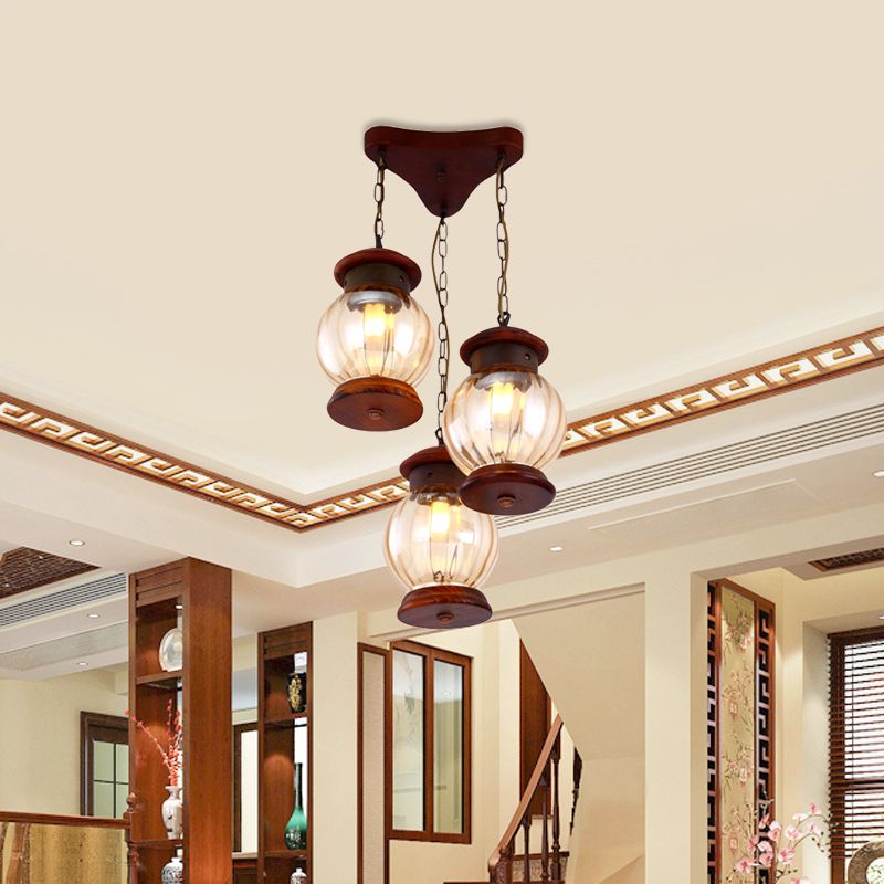 Factory Lantern Cluster Pendant 3-Bulb Tan Glass Suspension Lighting in Copper with Wood Triangle Canopy