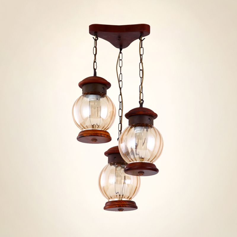 Factory Lantern Cluster Pendant 3-Bulb Tan Glass Suspension Lighting in koper met houten driehoekige luifel