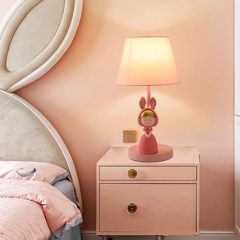 Tapered Drum Nightstand Lamp Kids Fabric Single-Bulb Bedroom Table Light with Resin Figurine in Pink