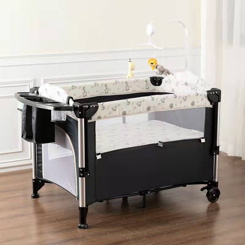 2-in-1 Folding Crib in Black Mini Crib With Wheels and Storage