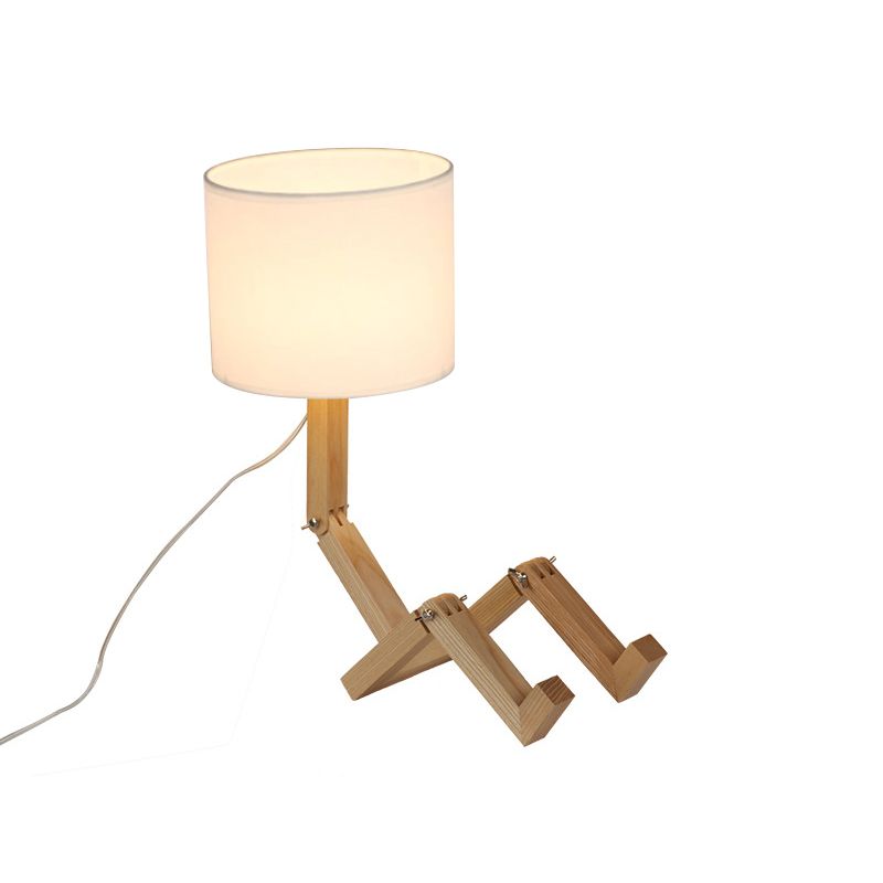 Lampe de table en forme d'homme Nouveauté en bois moderne Single Single Béges / noir / blanc Lumière de nuit avec conception de rack de livres et nuance de tissu de cylindre