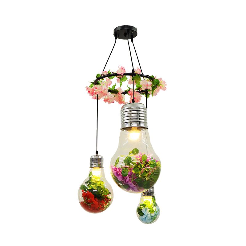 Heldere glazen lampcluster hanger industrieel 3 lichten restaurant led plafondlamp in zwart met bloemendecoratie