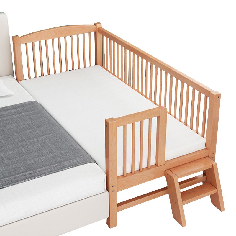 Functional Nursery Crib with Adjustable Height in Natural Wood