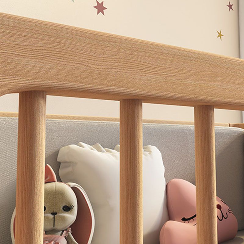 Contemporary Nursery Crib with Adjustable Height and Casters in Beech