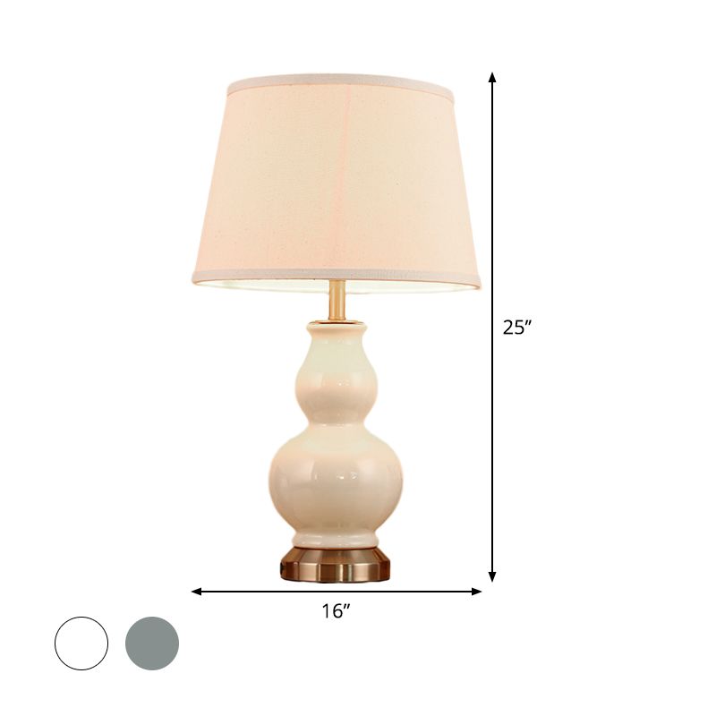 Compito curvo luce ceramica moderna 1 lampadina rosa/bianco lampada da comodino con tonalità in tessuto, 13 "/16" di larghezza