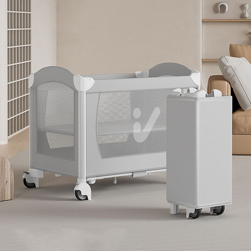 Plastic & Metal Crib with Casters 2-in-1 Folding Crib in White/Gray with Storage