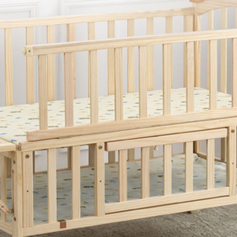 Contemporary Solid Wood Baby Crib with Under Crib Storage in Natural