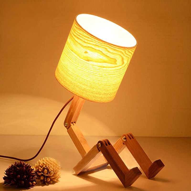 Lampe de table en forme d'homme Nouveauté en bois moderne Single Single Béges / noir / blanc Lumière de nuit avec conception de rack de livres et nuance de tissu de cylindre