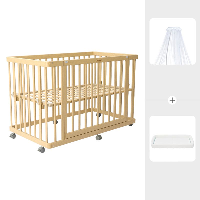 Contemporary 25.19" Wide Wooden Nursery Bed in Natural with Wheels