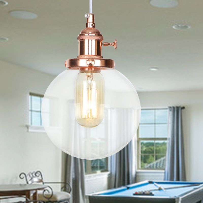 Orbit Hanging Lighting Farmhouse Amber/Clear Glass 1 bol hanglamp met verstelbaar koord in zwart/brons/messing afwerking