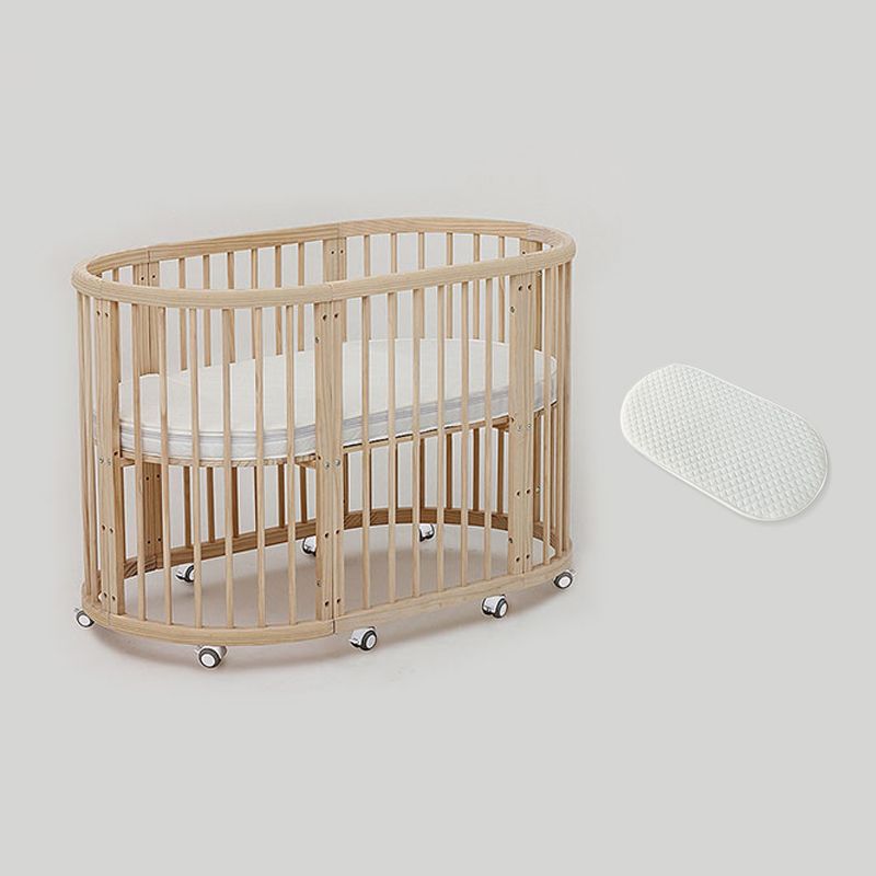 Oval Solid Wood Crib Nordic Style 5-In-1 Convertible Crib with Casters