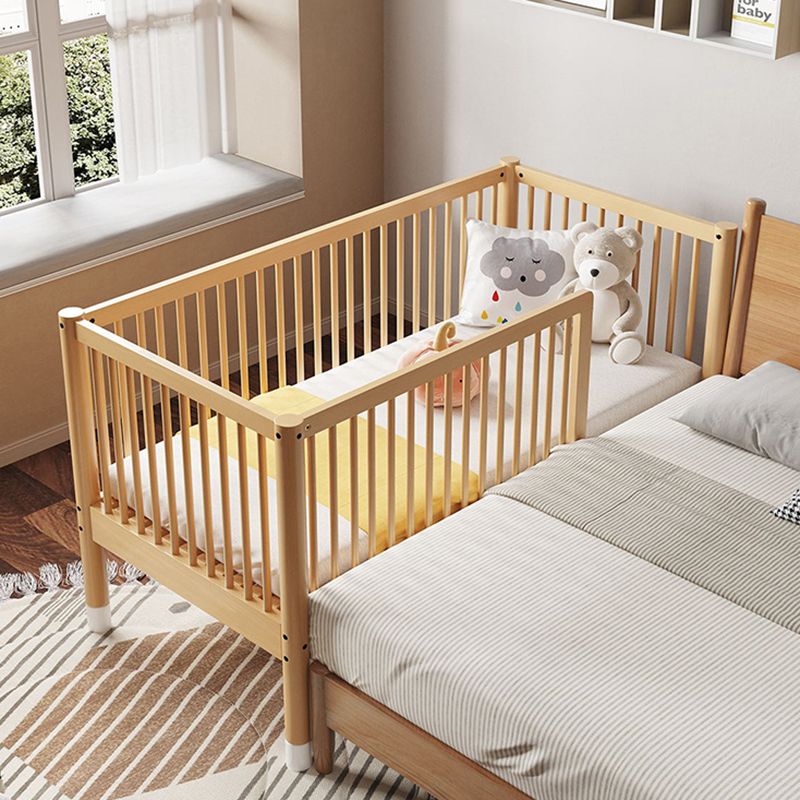 Modern Farmhouse Nursery Crib with Adjustable Height in Natural Wood