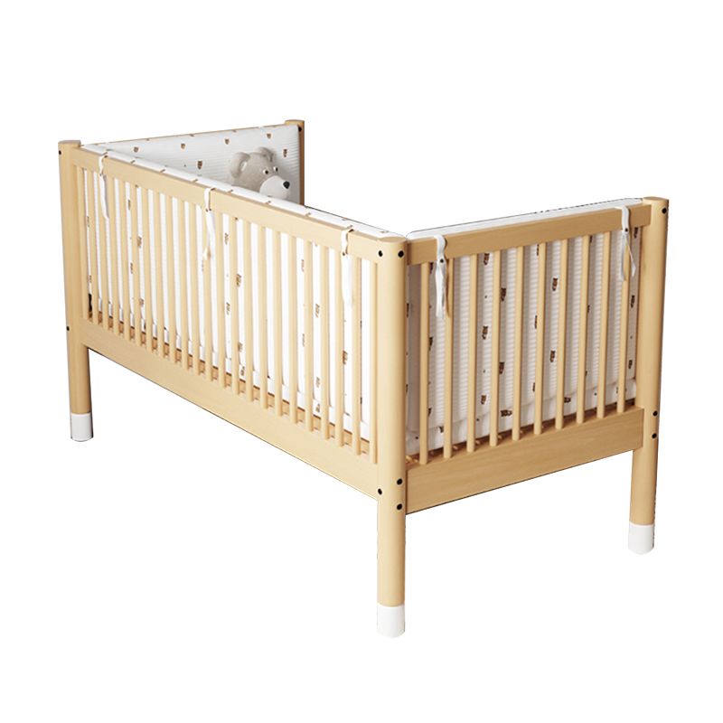 Modern Farmhouse Nursery Crib with Adjustable Height in Natural Wood