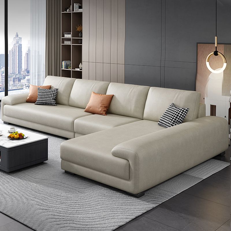 133.9"W √ó 70.87"D √ó35.43"H  Faux Leather Pillow Top Arm Sectional with Stain-Resistant