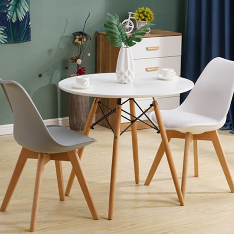 Scandinavian Home Side Chair Indoor Solid Back Plastic Dining Room Chair with Wood Legs