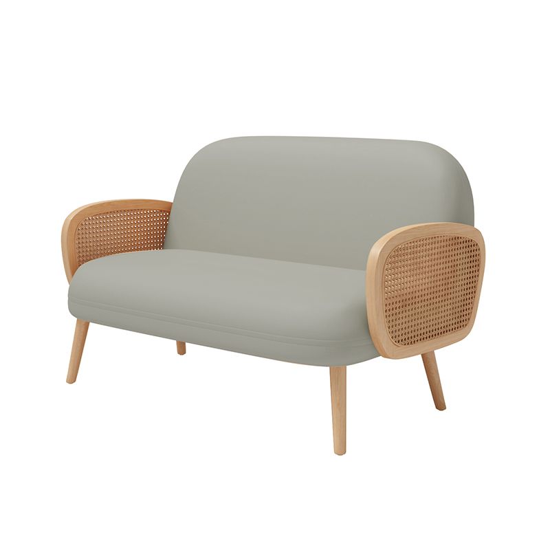 Canapé beige scandinave carré tufté avec 4 pattes en bois pour l'appartement