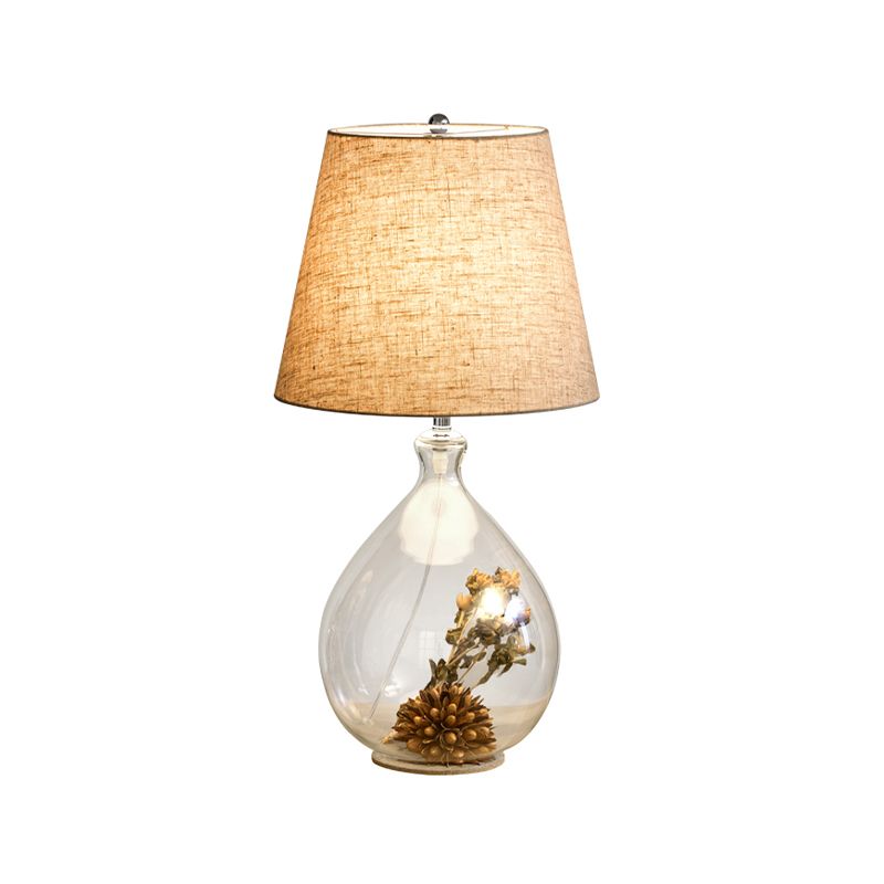 Modern 1 Head Table Light Clear Waterdrop/Bottle Glass Night Lighting with Dried Flower Decor and Flaxen Fabric Shade