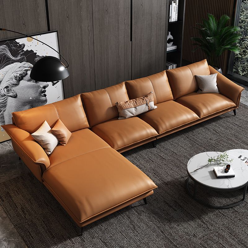 Orange Sponge Padded Leather Sofa with Pillow Back and Flared Armrest Sectional