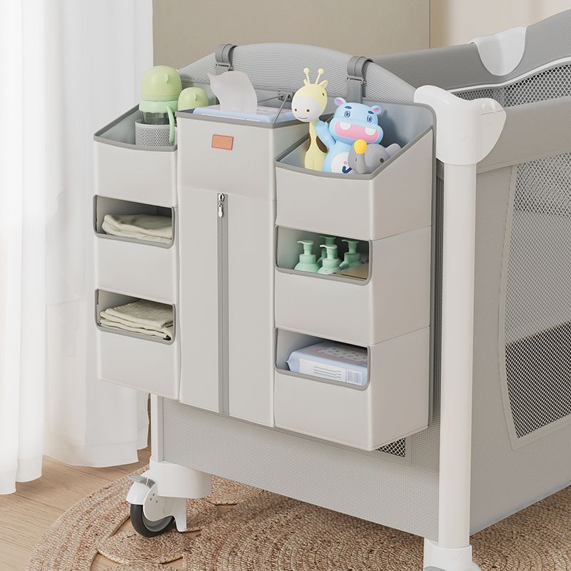 Plastic & Metal Crib with Casters 2-in-1 Folding Crib in White/Gray with Storage