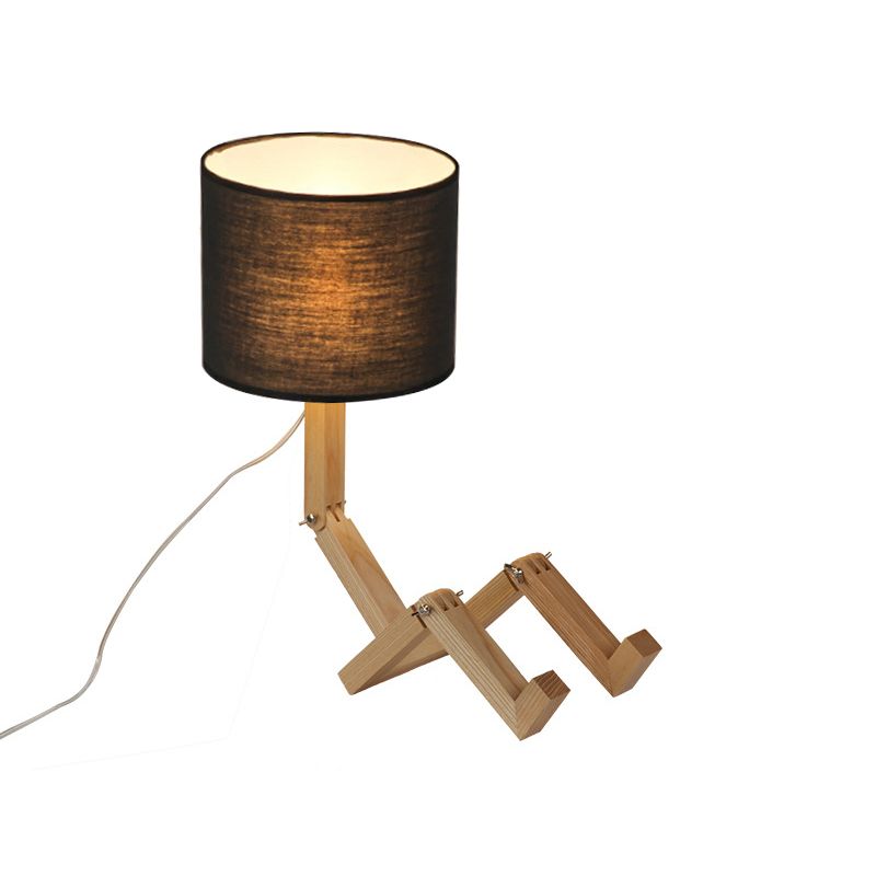 Lampe de table en forme d'homme Nouveauté en bois moderne Single Single Béges / noir / blanc Lumière de nuit avec conception de rack de livres et nuance de tissu de cylindre