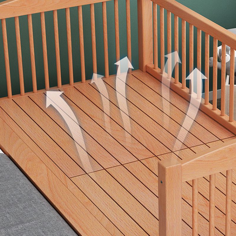 Functional Nursery Crib with Adjustable Height in Natural Wood