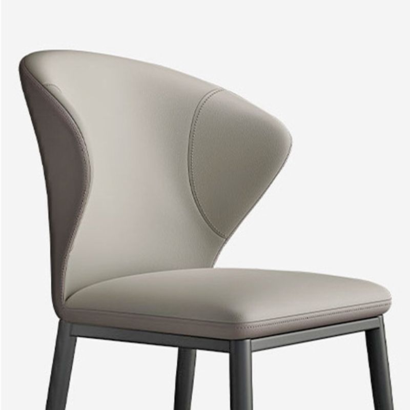 Minimalist Wingback Armless Dining Chair Faux Leather Side Chair