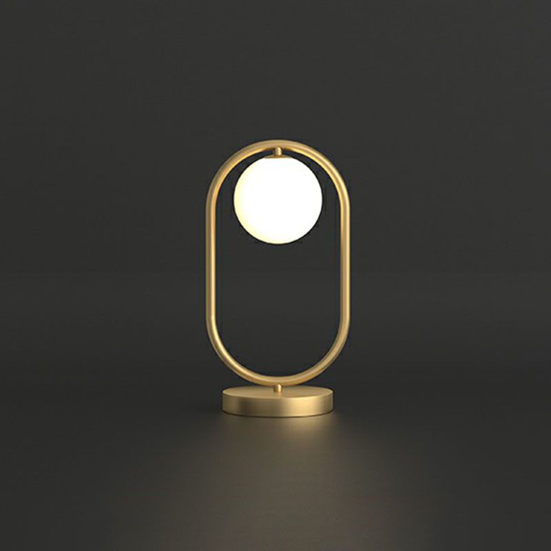 Minimalist Oval Frame Table Lighting Metal 1-Head Bedroom Night Light with Ball Milk Glass Shade in Gold