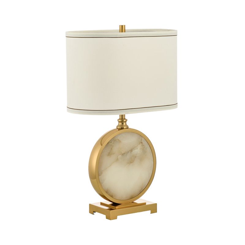 Fabric Oval Night Lamp Minimalism 1 Head Table Stand Light with Round Base in Brass and White