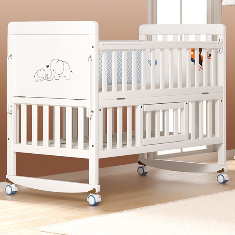 Scandinavian 2-in-1 Solid Wood Nursery Bed in White Wheels and Storage