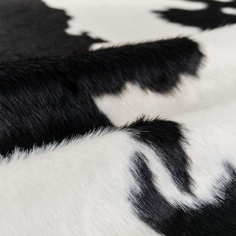 Shaggy Cow Skin Area Rug Black and White Contemporary Rug Polyester Non-Slip Washable Pet Friendly Carpet for Home