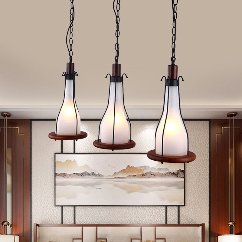 Brown Bottle Cluster Pendant Light Warehouse Yellow/White Glass 3 Heads Dining Room Ceiling Fixture with Wood Linear Canopy