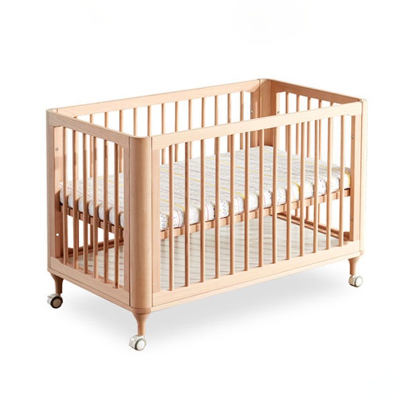 Solid Wood Convertible Crib in Nature Modern Standard Crib with Guardrail and Wheels