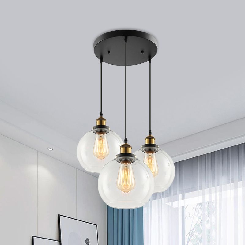 3/4-Light Clear Glass Multi Hanging Light Fixture Industrial Antique Brass Orb Living Room Pendant with Round Canopy