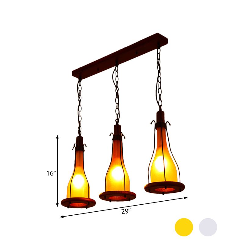 Brown Bottle Cluster Pendant Light Warehouse Yellow/White Glass 3 Heads Dining Room Ceiling Fixture with Wood Linear Canopy