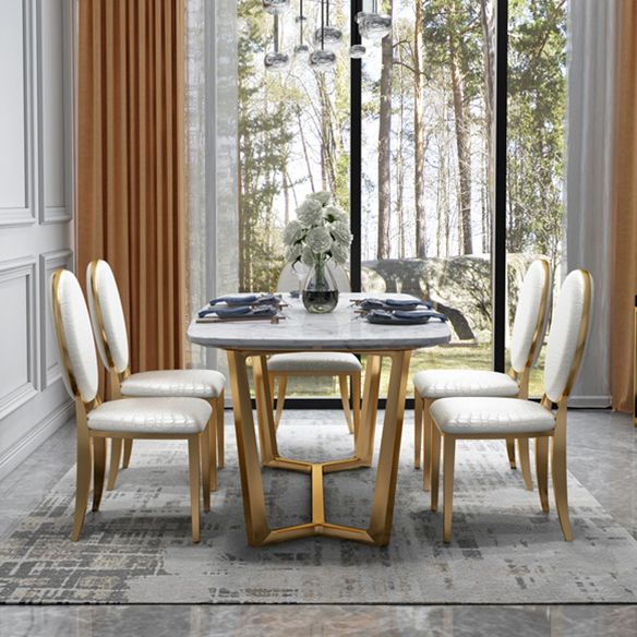 Set di sala da pranzo in marmo moderno con tavolo bianco e base di cavalletto dorato per uso domestico