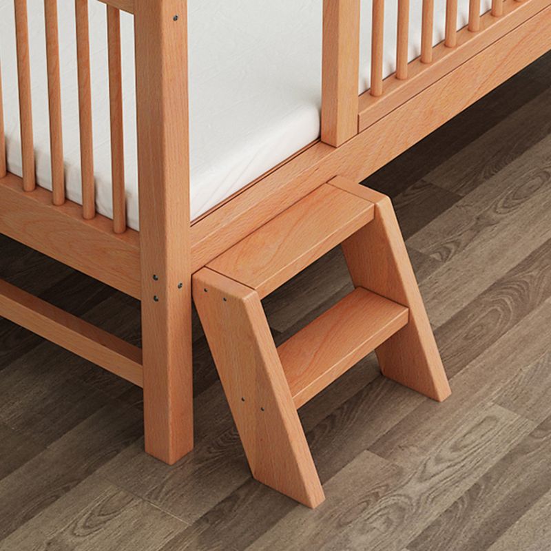 Functional Nursery Crib with Adjustable Height in Natural Wood