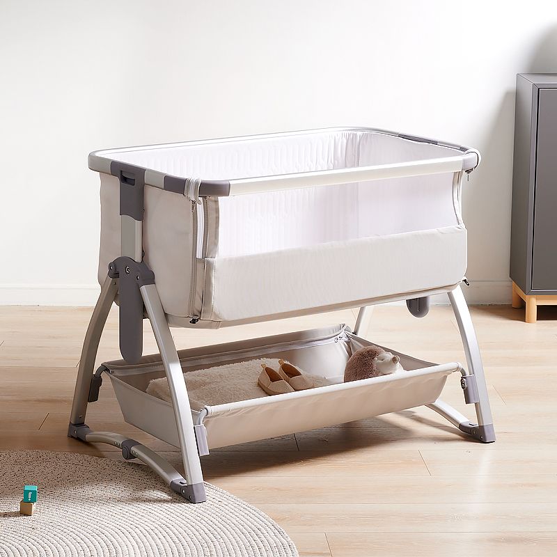 Gliding and Adjustable Metal Bassinet Oval Cradle with 4 Wheels and Storage Shelf