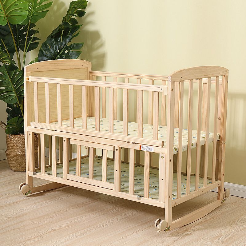 Convertible Nursery Crib with Casters and Changing Table in Light Wood