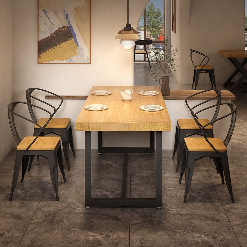 Set da pranzo in legno solido in stile industriale con tavolo a forma di rettangolo e base di cavalletto per uso domestico