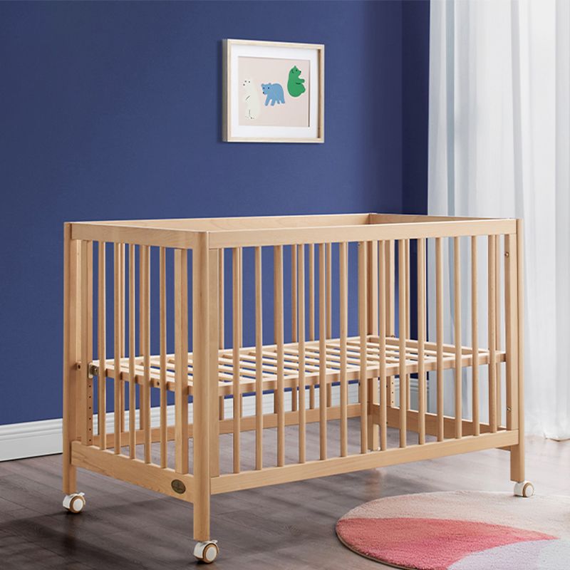 Contemporary Natural Wooden Baby Crib with Wheels and Storage