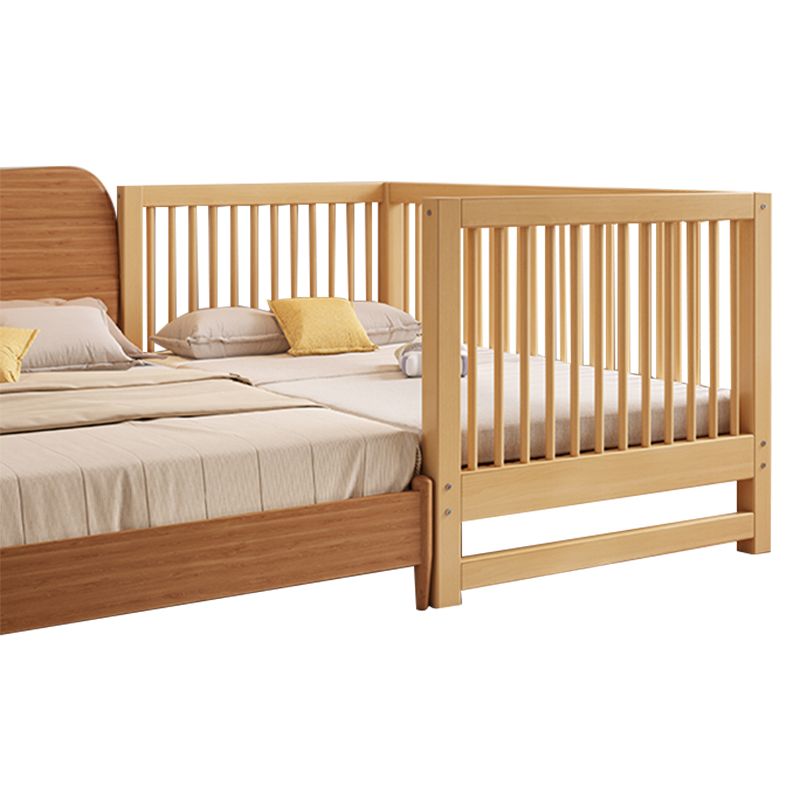 Functional Nursery Crib with Adjustable Height in Natural Wood